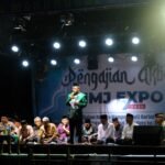Wakil Gubernur Jambi, Abdullah Sani saat menghadiri HUT ke-32 Desa Marga Manunggal Jaya, Kecamatan Sungai Bahar