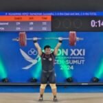 Aksi lifter andalan Jambi M Ripqi Ramadhan di PON Aceh-Sumut 2024 lalu