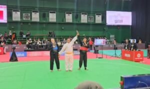 Pesilat Jambi Zafi Arza yang turun di kelas H putra PON Bela Diri Kudus, usai mengalahkan lawannya dari Sumsel