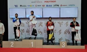 Pesilat Jambi Andhini Ayu Puspita Dewi berhasil menyumbang medali perak kelas D putri PON Bela Diri 2025