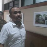 David Hadiosman saat keluar dari ruangan penyidik Diteskrimsus Polda Jambi