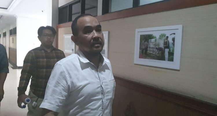David Hadiosman saat keluar dari ruangan penyidik Diteskrimsus Polda Jambi